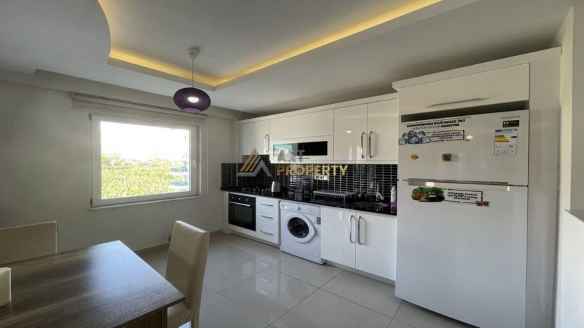 Квартира 1+1 с мебелью с красивым видом на горы в комплексе с развитой инфраструктурой, Махмутлар, 70 м2 - Ракурс 3