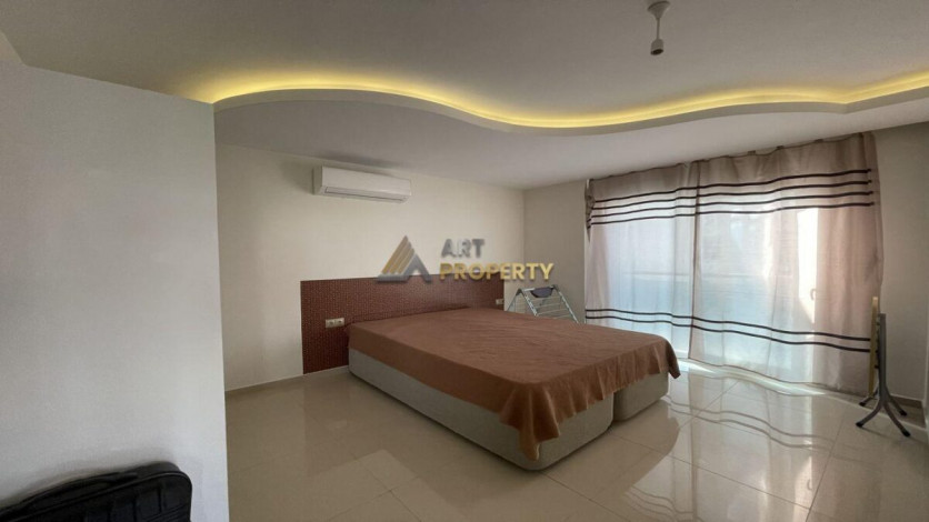 Квартира 1+1 с мебелью с красивым видом на горы в комплексе с развитой инфраструктурой, Махмутлар, 70 м2 - Ракурс 4