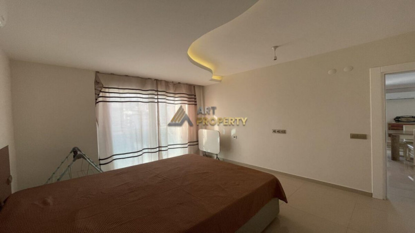 Квартира 1+1 с мебелью с красивым видом на горы в комплексе с развитой инфраструктурой, Махмутлар, 70 м2 - Ракурс 6