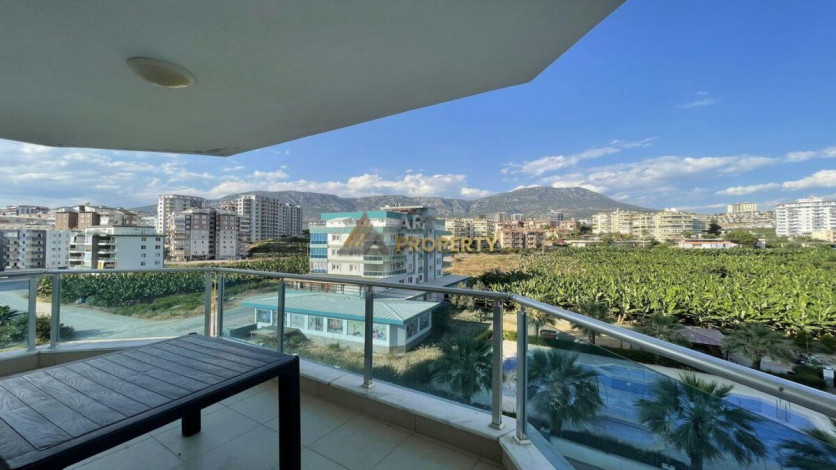 Квартира 1+1 с мебелью с красивым видом на горы в комплексе с развитой инфраструктурой, Махмутлар, 70 м2 - Ракурс 8