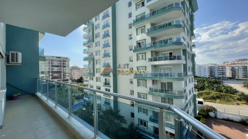 Квартира 1+1 с мебелью с красивым видом на горы в комплексе с развитой инфраструктурой, Махмутлар, 70 м2 - Ракурс 10