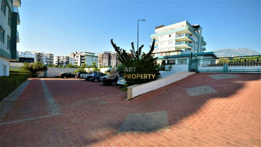 Квартира 1+1 с мебелью с красивым видом на горы в комплексе с развитой инфраструктурой, Махмутлар, 70 м2 - Ракурс 11