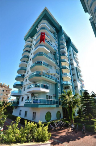 Квартира 1+1 с мебелью с красивым видом на горы в комплексе с развитой инфраструктурой, Махмутлар, 70 м2 - Ракурс 12