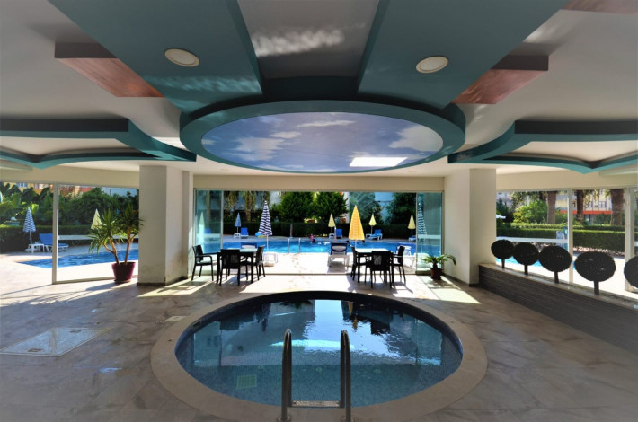 Квартира 1+1 с мебелью с красивым видом на горы в комплексе с развитой инфраструктурой, Махмутлар, 70 м2 - Ракурс 19