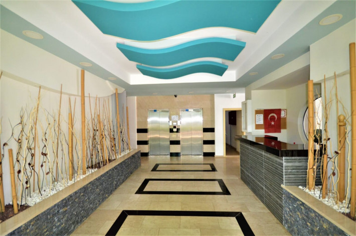 Квартира 1+1 с мебелью с красивым видом на горы в комплексе с развитой инфраструктурой, Махмутлар, 70 м2 - Ракурс 20