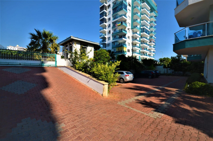 Квартира 1+1 с мебелью с красивым видом на горы в комплексе с развитой инфраструктурой, Махмутлар, 70 м2 - Ракурс 22