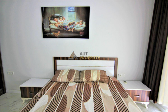 Квартира 1+1 с мебелью с видом на море в Махмутларе, 65 м2 - Ракурс 13