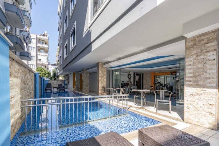 Квартира 2+1 с новой мебелью в самом центре Алании в новом доме с инфраструктурой, 100 м2 - Ракурс 11