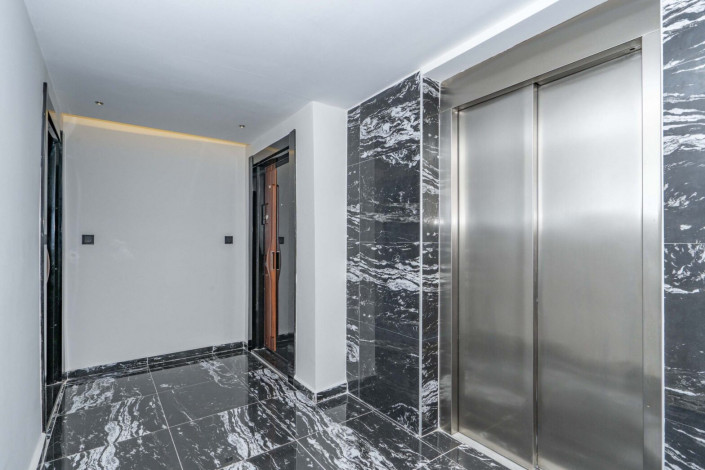 Квартира 2+1 с новой мебелью в самом центре Алании в новом доме с инфраструктурой, 100 м2 - Ракурс 12