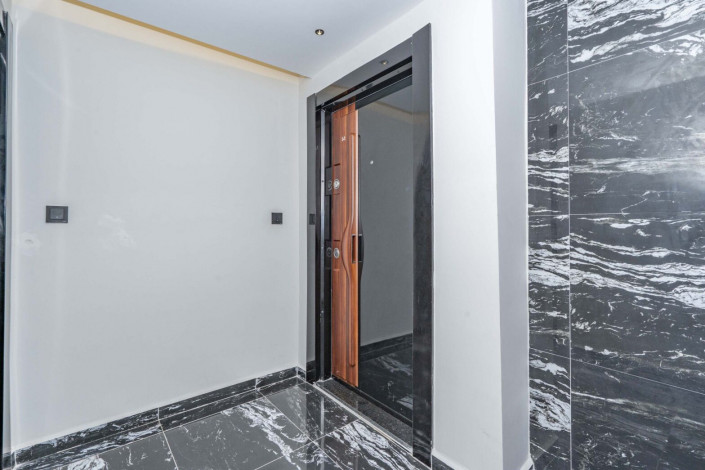 Квартира 2+1 с новой мебелью в самом центре Алании в новом доме с инфраструктурой, 100 м2 - Ракурс 13