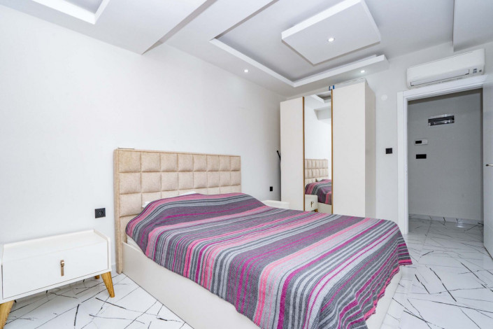 Квартира 2+1 с новой мебелью в самом центре Алании в новом доме с инфраструктурой, 100 м2 - Ракурс 20