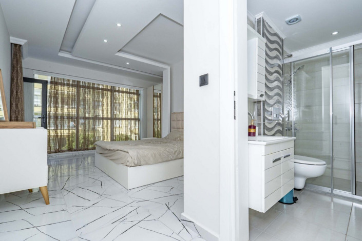 Квартира 2+1 с новой мебелью в самом центре Алании в новом доме с инфраструктурой, 100 м2 - Ракурс 21