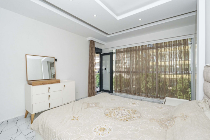 Квартира 2+1 с новой мебелью в самом центре Алании в новом доме с инфраструктурой, 100 м2 - Ракурс 23