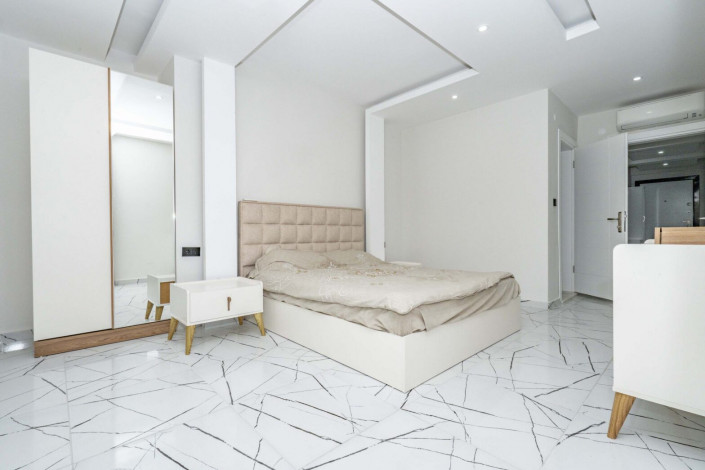 Квартира 2+1 с новой мебелью в самом центре Алании в новом доме с инфраструктурой, 100 м2 - Ракурс 24