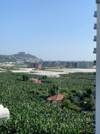 Квартира 1+1 с новой мебелью в Махмутларе, 55 м2 - Ракурс 10