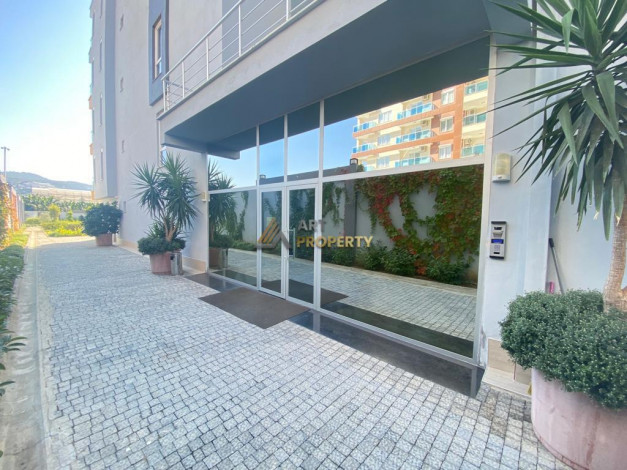 Квартира 1+1 с новой мебелью в Махмутларе, 55 м2 - Ракурс 38