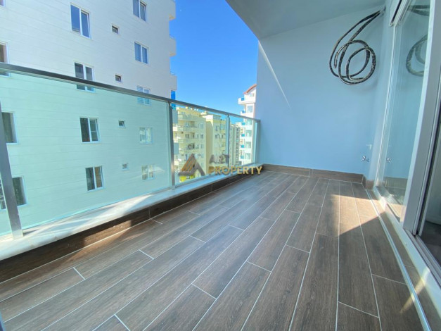 Квартира 1+1 с новой мебелью в Махмутларе, 55 м2 - Ракурс 43