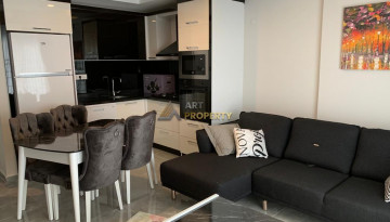 Квартира 1+1 с новой мебелью в Махмутларе, 55 м2 - Ракурс 46