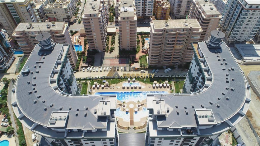 Квартира 1+1 с люкс мебелью в новом комплексе с развитой инфраструктурой отеля 5* в Махмутларе, 55 м2 - Ракурс 19