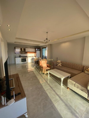 Двухкомнатная квартира в комплексе с хорошей инфраструктурой в Махмутларе, 65 м2 - Ракурс 13