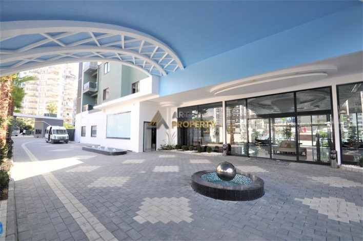 Трехкомнатная квартира в комплексе c инфраструктурой отельного уровня в районе Махмутлар, 88 м2 - Ракурс 7