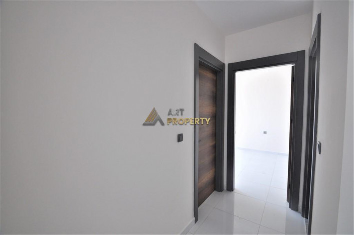 Трехкомнатная квартира в комплексе c инфраструктурой отельного уровня в районе Махмутлар, 88 м2 - Ракурс 18