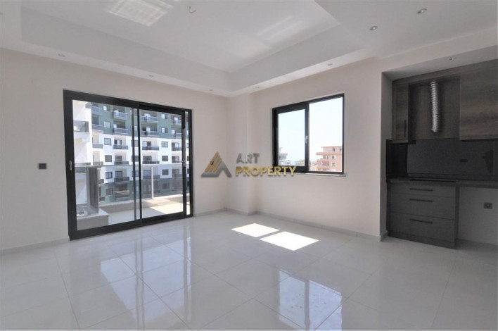 Трехкомнатная квартира в комплексе c инфраструктурой отельного уровня в районе Махмутлар, 88 м2 - Ракурс 20