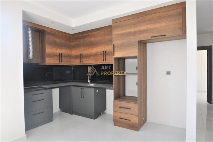 Трехкомнатная квартира в комплексе c инфраструктурой отельного уровня в районе Махмутлар, 88 м2 - Ракурс 21