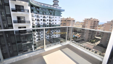 Трехкомнатная квартира в комплексе c инфраструктурой отельного уровня в районе Махмутлар, 88 м2 - Ракурс 26