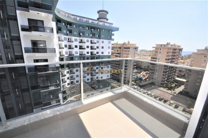 Трехкомнатная квартира в комплексе c инфраструктурой отельного уровня в районе Махмутлар, 88 м2 - Ракурс 25