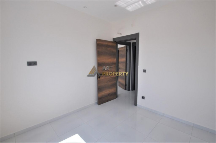 Трехкомнатная квартира в комплексе c инфраструктурой отельного уровня в районе Махмутлар, 88 м2 - Ракурс 33