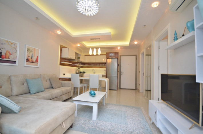 Квартира 1+1 с мебелью в комплексе на первой линии моря в Махмутларе, 66 м2 - Ракурс 2