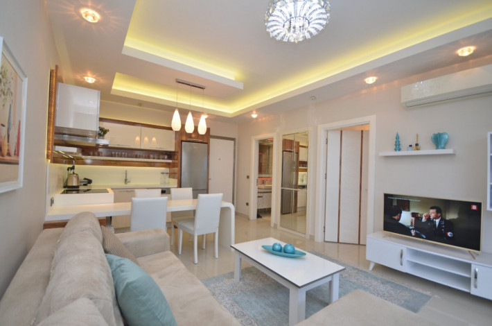 Квартира 1+1 с мебелью в комплексе на первой линии моря в Махмутларе, 66 м2 - Ракурс 7