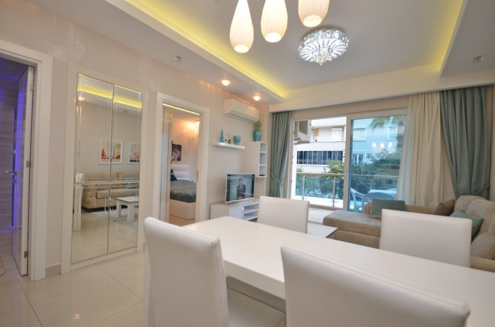 Квартира 1+1 с мебелью в комплексе на первой линии моря в Махмутларе, 66 м2 - Ракурс 8