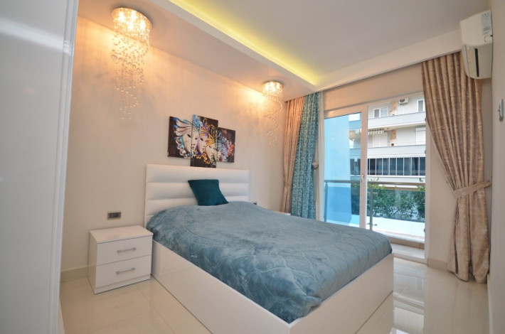 Квартира 1+1 с мебелью в комплексе на первой линии моря в Махмутларе, 66 м2 - Ракурс 10