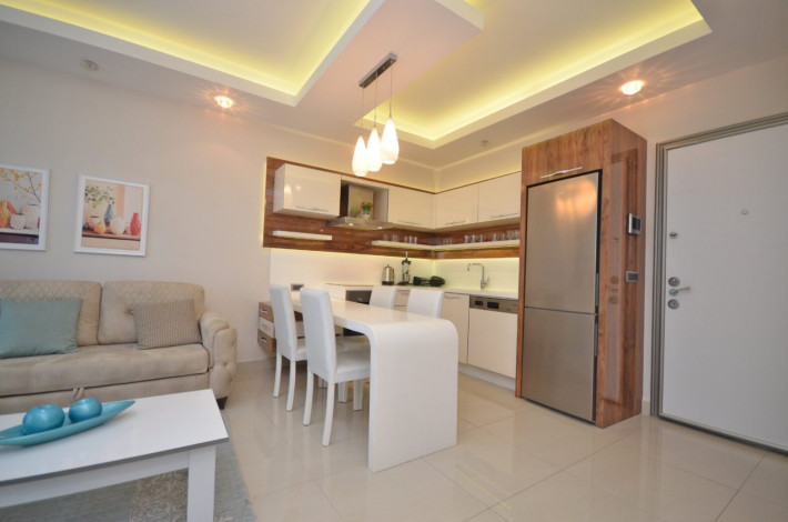 Квартира 1+1 с мебелью в комплексе на первой линии моря в Махмутларе, 66 м2 - Ракурс 13