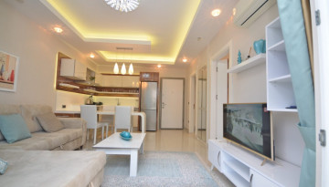 Квартира 1+1 с мебелью в комплексе на первой линии моря в Махмутларе, 66 м2 - Ракурс 15