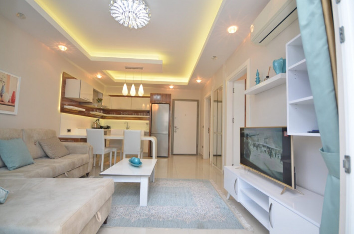 Квартира 1+1 с мебелью в комплексе на первой линии моря в Махмутларе, 66 м2 - Ракурс 14