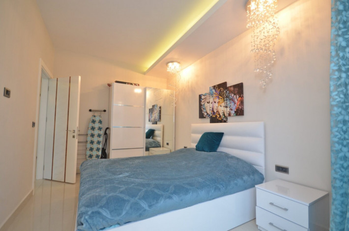 Квартира 1+1 с мебелью в комплексе на первой линии моря в Махмутларе, 66 м2 - Ракурс 15