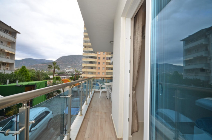 Квартира 1+1 с мебелью в комплексе на первой линии моря в Махмутларе, 66 м2 - Ракурс 16