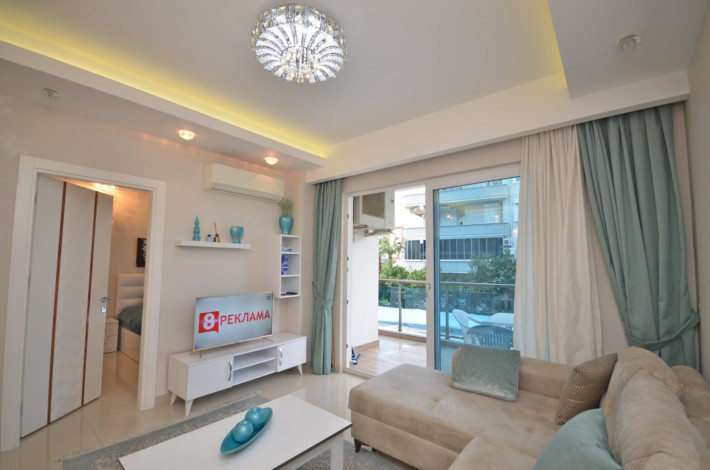 Квартира 1+1 с мебелью в комплексе на первой линии моря в Махмутларе, 66 м2 - Ракурс 17