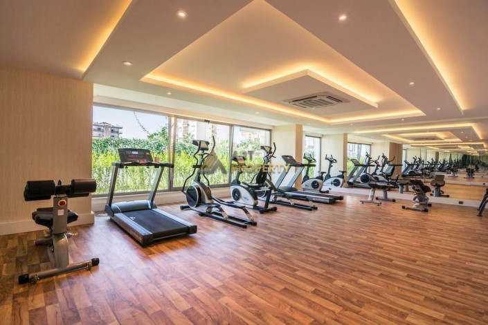 Квартира 1+1 с мебелью в комплексе на первой линии моря в Махмутларе, 66 м2 - Ракурс 24