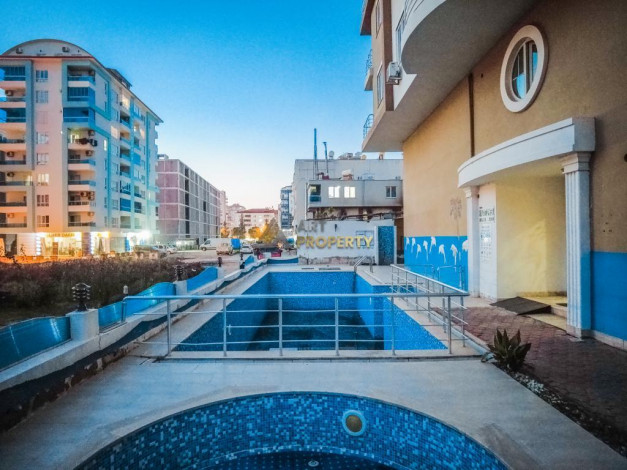 Срочная продажа квартиры 1+1 с мебелью в центре Махмутлара, 55 м2 - Ракурс 15