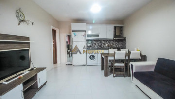 Срочная продажа квартиры 1+1 с мебелью в центре Махмутлара, 55 м2 - Ракурс 18