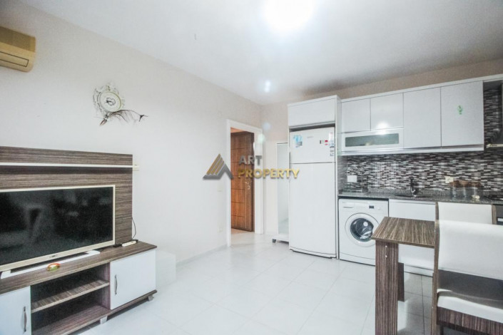 Срочная продажа квартиры 1+1 с мебелью в центре Махмутлара, 55 м2 - Ракурс 20