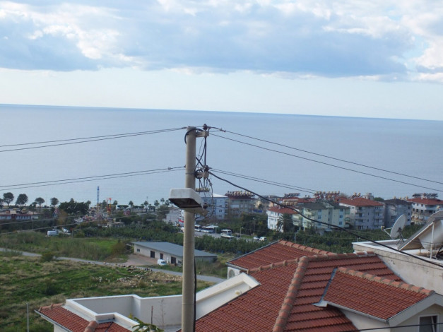 Квартира 2+1 в центральной части Алании с собственным садом и видом на море, 100 м2 - Ракурс 9