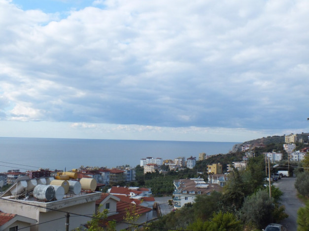 Квартира 2+1 в центральной части Алании с собственным садом и видом на море, 100 м2 - Ракурс 13