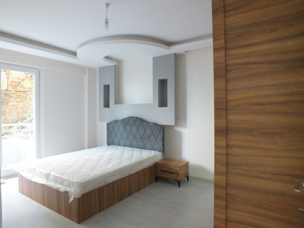 Квартира 2+1 в центральной части Алании с собственным садом и видом на море, 100 м2 - Ракурс 24