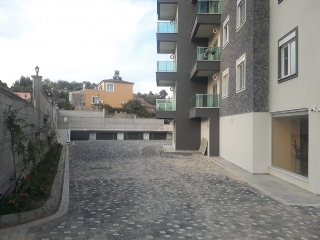 Квартиры 1+1 в новостройке в районе Авсаллар, 55 м2 - Ракурс 4