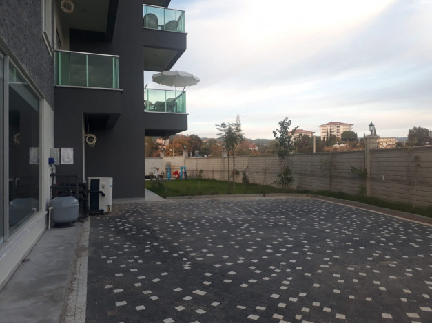 Квартиры 1+1 в новостройке в районе Авсаллар, 55 м2 - Ракурс 11